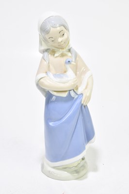 Lot 522 - NAO; four assorted figures to include a girl...