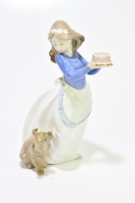 Lot 522 - NAO; four assorted figures to include a girl...