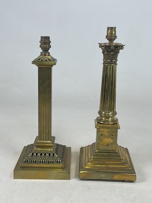 Lot 629 - Two brass column table lamps with stepped...