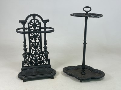 Lot 226 - Two decorative cast iron umbrella stands,...