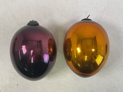 Lot 27 - Two 20th century glass witches' balls, height...