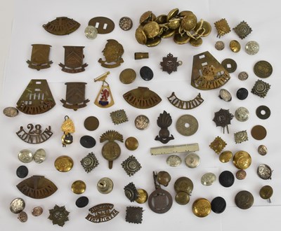 Lot 345 - A quantity of assorted military cap badges,...