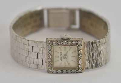 Lot 1697 - VERTEX; a lady's 9ct white gold diamond bezel...