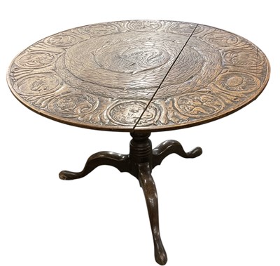 Lot 28 - An interesting 18th/19th century oak circular...