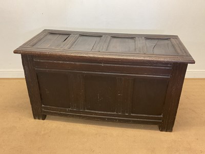 Lot 414 - An early 18th century oak coffer, width 137cm.