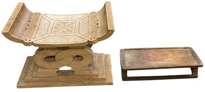 Lot 657 - An African carved wooden Ashanti stool, Ghana,...