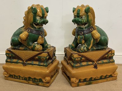 Lot 266 - A pair of Chinese Temple or Fo dogs raised on...