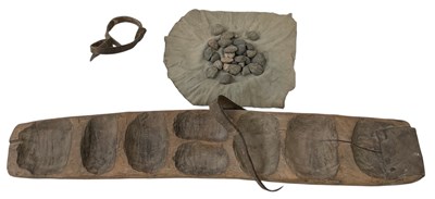 Lot 659 - An African carved wooden rectangular board...