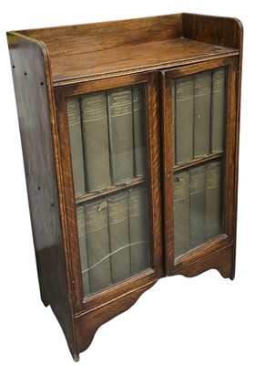 Lot 36 - THE ENCYCLOPAEDIA BRITANNICA; a 1920s oak...