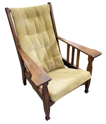 Lot 65 - An early 20th century Arts and Crafts oak...