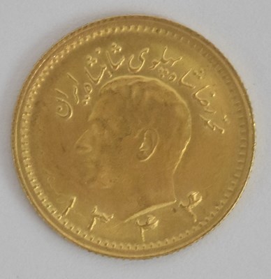 Lot 1635 - A Persian one quarter Pahlavi gold coin, 1917,...
