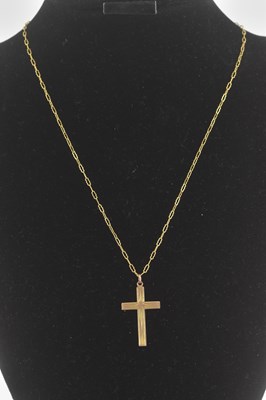 Lot 1441 - A 9ct gold cross pendant, length 2.6cm, on a...