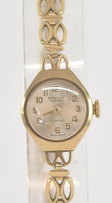 Lot 1723 - EXCALIBUR; a lady's 9ct gold wristwatch, the...