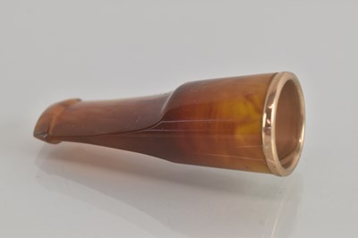 Lot 1212 - A large amber cigar holder, with rose gold...