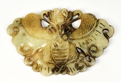 Lot 377 - Two carved jade pendants, one decorated with a...