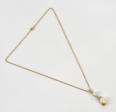 Lot 263 - A yellow metal pearl set drop pendant, length...