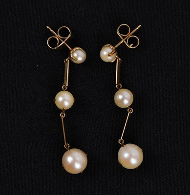 Lot 197 - A pair of yellow metal pearl set drop earrings,...