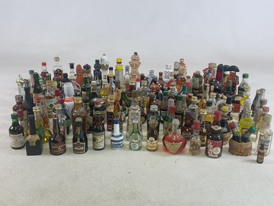 Lot 295 - MINIATURES; a quantity of miniature alcohol...