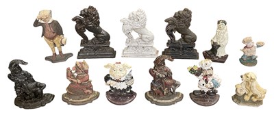 Lot 108 - A collection of twelve assorted cast iron...