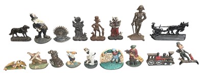 Lot 111 - A collection of seventeen assorted cast iron...
