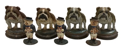 Lot 110 - A set of four vintage cast iron painted...