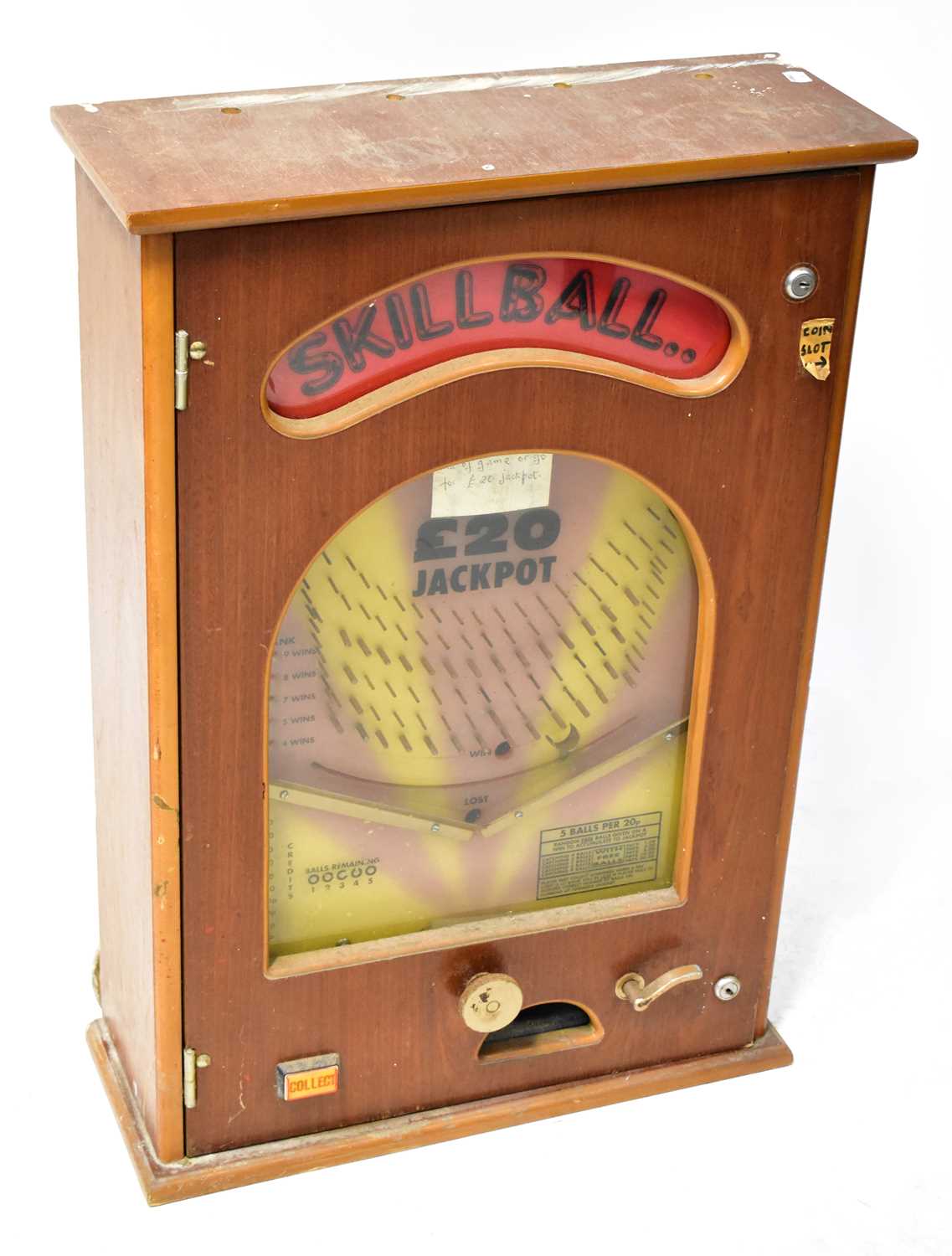 Lot 531 - A wooden cased, wall-mounted slot machine