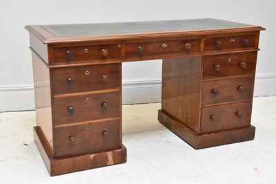 Lot 1078 - A 19th century mahogany pedestal desk with an...
