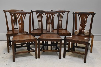 Lot 1028 - Seven assorted George III oak dining chairs,...
