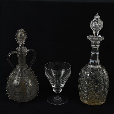 Lot 1741 - A 19th century clear glass twin handled...