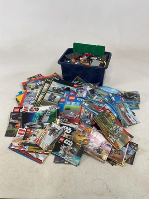 Lot 133 - LEGO: a quantity of LEGO bricks and building...