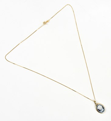 Lot 296 - A Victorian yellow metal pendant of oval form,...