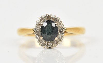 Lot 477 - A yellow metal diamond and sapphire oval dress...