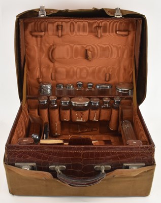 Lot 1069 - WILLIAM GEIGER; an Edward VII crocodile skin...