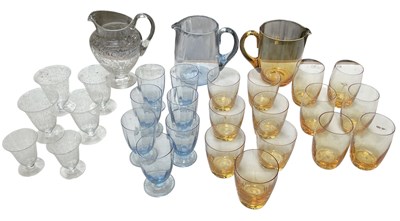 Lot 585 - WHITEFRIARS; a gold amber water set including...