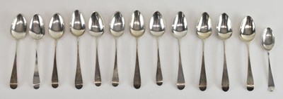 Lot 1139 - Thirteen hallmarked silver coffee spoons, with...