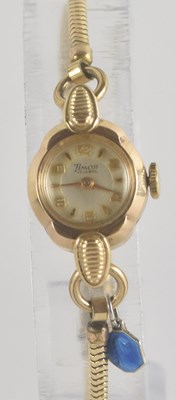 Lot 1750 - TIMOR; a lady's 9ct gold wristwatch, the...