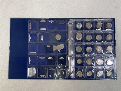 Lot 580 - CHANGE CHECKER; an album of coins comprising...