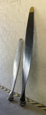 Lot 1200 - A large black painted propeller section with...