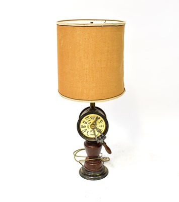 Lot 120 - A novelty ship's lamp, with brass column...