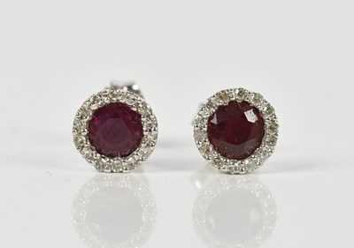 Lot 179 - A pair of white metal ear studs, stamped 375,...