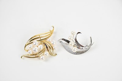Lot 111 - MIKIMOTO; a yellow metal pearl set brooch...