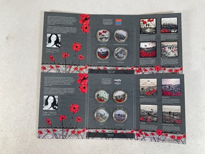 Lot 597 - ROYAL MINT; two War Poppy collections by...