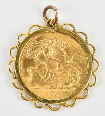 Lot 228 - An Elizabeth II full sovereign, 1964, in...