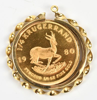 Lot 220 - A 1/4 Krugerrand, 1980, fitted in yellow metal...
