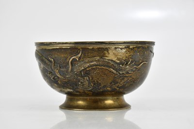 Lot 2050 - A Chinese white metal bowl decorated with four...