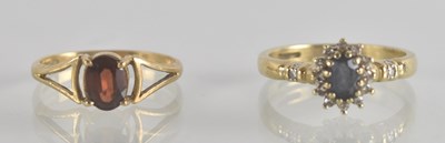 Lot 1304 - Two 9ct gold dress rings, one with claw set...