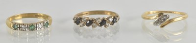Lot 1296 - Three 9ct gold dress rings, one with a half...