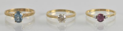 Lot 1310 - Three 9ct gold dress rings, one with claw set...