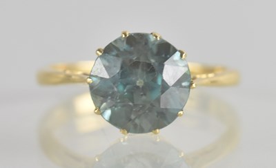 Lot 1271 - An 18ct gold blue topaz set ring, the large...