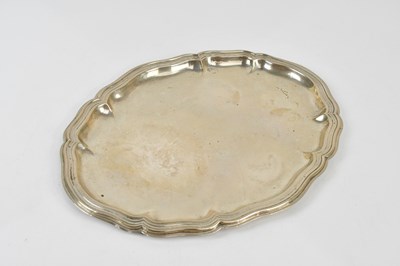 Lot 2253 - A Continental silver salver of shaped form,...